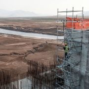 A worker goes down a construction ladder at the Grand Ethiopian Renaissance Dam on the Blue Nile in Ethiopia on Dec. 26, 2019. A worker goes down a construction ladder at the Grand Ethiopian Renaissance Dam on the Blue Nile in Ethiopia on Dec. 26, 2019.