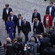 Leading members of the German Social Democrats, the Greens Party and the German Free Democrats arrive to present their mutually-agreed on coalition contract on November 24, 2021 in Berlin. If the parties' members approve the agreement, the Bundestag is likely to hold a vote to appoint SPD leader Olaf Scholz as chancellor the week of Dec. 6. Leading members of the German Social Democrats, the Greens Party and the German Free Democrats arrive to present their mutually-agreed on coalition contract on November 24, 2021 in Berlin.