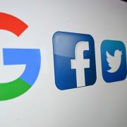 A photo taken on Oct. 21, 2020, shows the logos (left to right) of Google, Facebook, Twitter, Instagram, Snapchat and TikTok on a computer screen. A photo taken on Oct. 21, 2020, shows the logos (left to right) of Google, Facebook, Twitter, Instagram, Snapchat and TikTok on a computer screen.