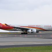 A Hong Kong Airlines plane lands Sept. 1, 2021, at Sydney Kingsford Smith Airport. Hong Kong authorities will suspend transit flights from 150 countries from Jan. 16 to Feb. 15 in response to the global spread of the omicron variant. A Hong Kong Airlines plane lands Sept. 1, 2021, at Sydney Kingsford Smith Airport.