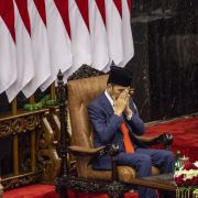 Indonesian President Joko "Jokowi" Widodo prays during his inauguration for his second term on Oct. 20, 2019, in Jakarta.