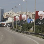 A picture taken on Jan. 11, 2020, shows portraits of Iraq's slain Popular Mobilization Unit deputy chief Abu Mahdi al-Muhandis, the late founder of Kataib Hezbollah, on the southern exit of the Lebanese capital Beirut.