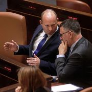 Israeli Prime Minister Naftali Bennett (left) speaks with Justice Minister Gideon Sa’ar in the Knesset on June 16, 2021. Israeli Prime Minister Naftali Bennett (left) speaks with Justice Minister Gideon Sa’ar in the Knesset on June 16, 2021.