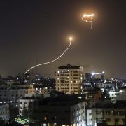 A streak of light appears as Israel's Iron Dome anti-missile system intercepts rockets on May 16, 2021, launched from the Gaza Strip.