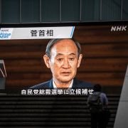 A screen in Tokyo broadcasts Japanese Prime Minister Yoshihide Suga’s resignation announcement on Sept. 3, 2021. A screen in Tokyo broadcasts Japanese Prime Minister Yoshihide Suga’s resignation announcement on Sept. 3, 2021.