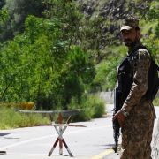 A soldier patrols the de-facto border between India and Pakistan in Kashmir. This photo shows a lone Pakistani soldier patrolling the Line of Control, the de facto border between Pakistan and India, in Pakistan-administered Kashmir on Aug. 29, 2019.