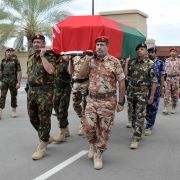 Omani army officers carry Sultan Qaboos bin Said al Said during a funeral procession Jan. 11 in Muscat.
