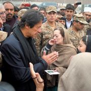 Pakistani Prime Minister Imran Khan meets with family members of schoolchildren killed in a 2014 massacre by Taliban militants in Peshawar. 