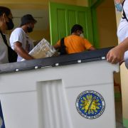 Poll workers carry a ballot box on May 4, 2022, at a polling station during preparations ahead of the May 9 presidential election in Manila, Philippines.A look at what the coming week will bring -- and a list of recommended RANE articles from the week that was.