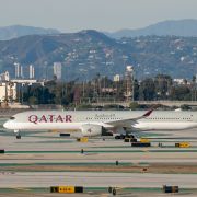 A Qatar Airways passenger jet prepares for take-off on the tarmac of the Los Angeles International Airport on Nov. 11, 2020, in Los Angeles, California. A Qatar Airways passenger jet prepares for take-off on the tarmac of the Los Angeles International Airport on Nov. 11, 2020, in Los Angeles, California.