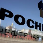 The walls surrounding the Kremlin are reflected on a plaque at the entrance of the oil company Rosneft's headquarters in Moscow. The walls surrounding the Kremlin are reflected on a plaque at the entrance of the oil company Rosneft's headquarters in Moscow.