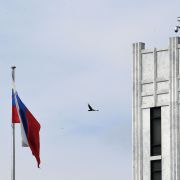 A bird flies past the flag outside the Russian embassy in Washington D.C. on April 15, 2021. A bird flies past the flag outside the Russian embassy in Washington D.C. on April 15, 2021.