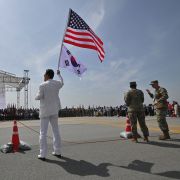A man waves U.S. and South Korean flags during a ceremony in Pyeongtaek, South Korea, on June 8, 2019. A man waves U.S. and South Korean flags during a ceremony in Pyeongtaek, South Korea, on June 8, 2019.