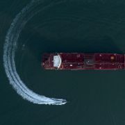 A boat circles the U.K.-flagged Stena Impero tanker in July 2019 after it was seized and detained by Iranian forces in the Strait of Hormuz. A boat circles the U.K.-flagged Stena Impero tanker in July 2019 after it was seized and detained by Iranian forces in the Strait of Hormuz.