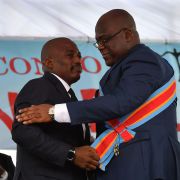 Outgoing Democratic Republic of the Congo President Joseph Kabila (L) embraces newly inaugurated President Felix Tshisekedi on Jan. 24, 2019, in Kinshasa.