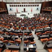Turkish President Recep Tayyip Erdogan (C) on Oct. 1, 2022, addresses parliament in Ankara, Turkey.