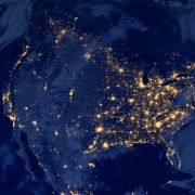 A satellite image of the United States at night.