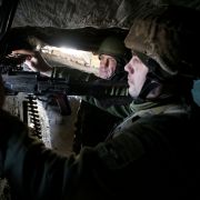 Ukrainian servicemen stand in position on the front line with Russia-backed separatists Feb. 19, 2021, in the Donetsk region. Ukrainian servicemen stand in position on the front line with Russia-backed separatists Feb. 19, 2021, in the Donetsk region.