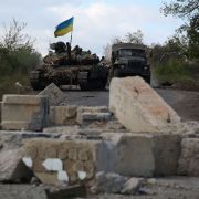 A Ukrainian tank on the road near the recently released Dolyna village in Ukraine's Donetsk region on Sept. 22, 2022.
